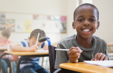 Boy with pencil fights hunger in relation to access to education